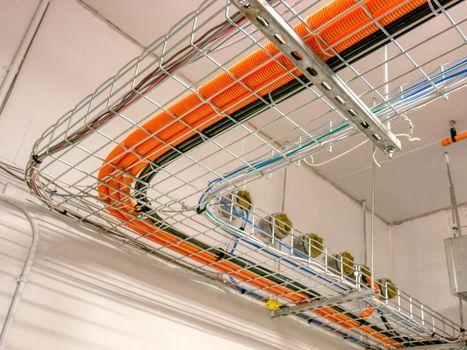 Corner cable route installed on metal wired tray.