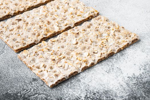 Crunchy crispbread Healthy snack set, on gray stone table background