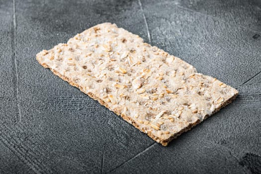 Set of crispy breads set, on gray stone table background
