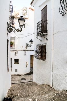Narrow streets and beautiful whitewashed facades in Altea village, Alicante, Spain