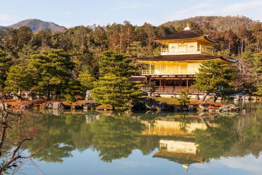 Kinkakuji Temple ( Rokuon-ji Temple ) . Golden Pavilion at Kyoto , Japan . Landscape view .