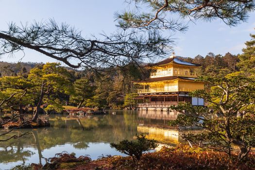 Kinkakuji Temple ( Rokuon-ji Temple ) . Golden Pavilion at Kyoto , Japan . Landscape view .