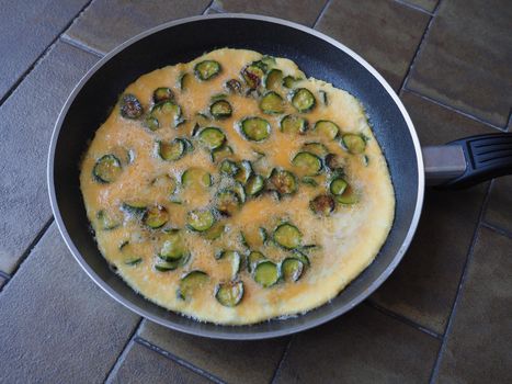 omelet made with eggs and zucchini vegetables