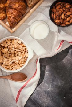 Breakfast with toast and croissant. milk in a glass bottle. Good start to the day. Good morning