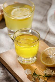 refreshing citrus lemonade,summer drink. Lemonade with fresh lemon on wooden background