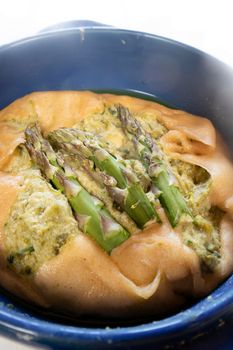 Vegan savory pie made with spelled flour and asparagus cream 