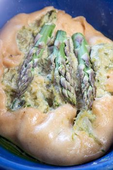 Vegan savory pie made with spelled flour and asparagus cream 