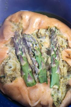 Vegan savory pie made with spelled flour and asparagus cream 