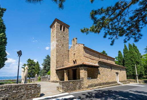 Muggia, Italy. June 13, 2021 view of the church of St. Mary Assunta in the old Muggia archaeological park