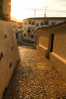 Narrow streets and beautiful whitewashed facades in Altea village, Alicante, Spain