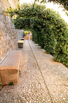 Narrow streets and beautiful gardens in Altea village, Alicante, Spain
