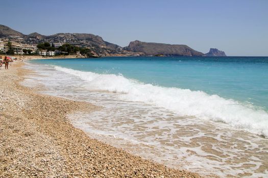 Beautiful Cap Negret beach on a sunny day of Spring in Altea, Alicante, Spain