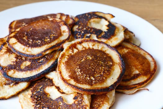 A plate of freshly baked homemade pancakes for breakfast