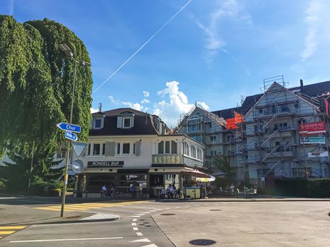 Richterswil, canton of Zurich, Switzerland circa June 2021: Historic building and house on street, Swiss architecture and real estate