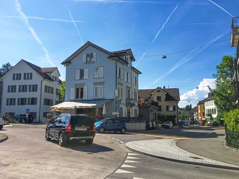 Richterswil, canton of Zurich, Switzerland circa June 2021: Historic building and house on street, Swiss architecture and real estate