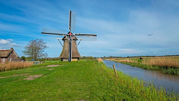 Oudkerker windmill in the countryside from the Netherlands