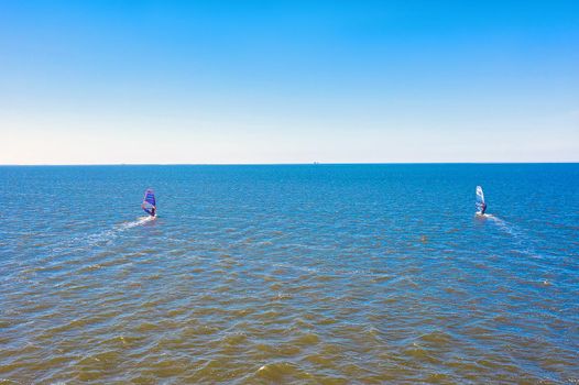 Aerial from two surfers on the Wadden Sea in the Netherlands