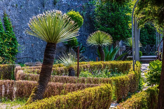 VARENNA, ITALY, JUNE 05, 2019 : exteriors and gardens of villa Monastero, on lake Como, june 05, 2019, in Varenna, italy