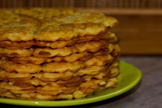 Homemade waffles in a plate, food photography and close-up photo of freshly made waffles