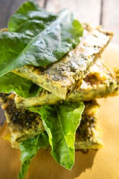 Vegan omelette cooking made with natural ingredients such as chickpea flour and chard 