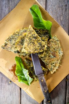 Vegan omelette cooking made with natural ingredients such as chickpea flour and chard 