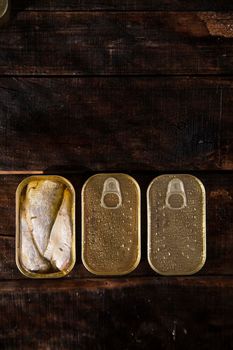 Series of boxes for storage containing sardines in olive oil