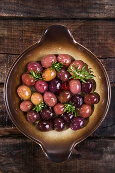 Italian food, snack of olives in brine presented in flat