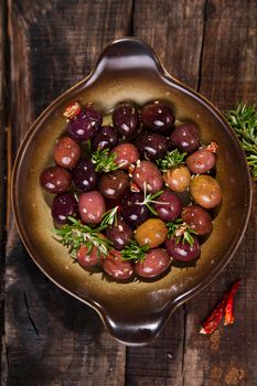 Italian food, snack of olives in brine presented in flat