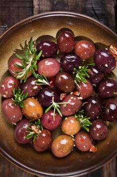 Italian food, snack of olives in brine presented in flat