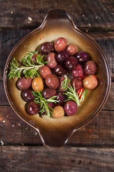 Italian food, snack of olives in brine presented in flat