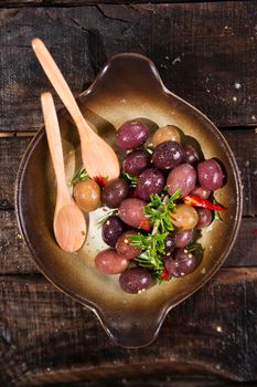 Italian food, snack of olives in brine presented in flat