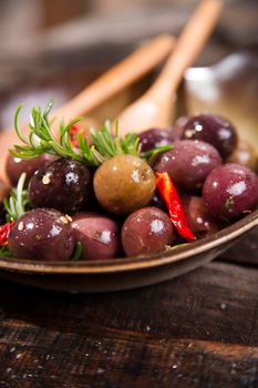 Italian food, snack of olives in brine presented in flat