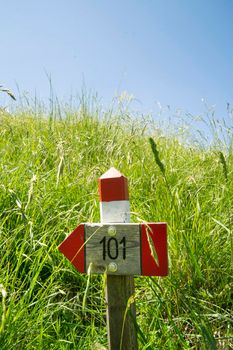 Signals typical for the identification of the path in the park of the Apuan Alps Italy