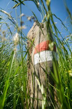 Signals typical for the identification of the path in the park of the Apuan Alps Italy