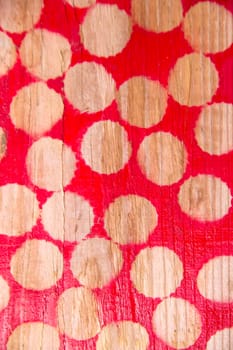 Background wooden base with colored circles of red color