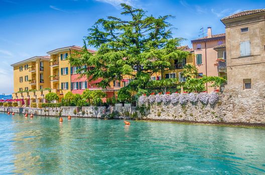 Scenic view of a canal in the city centre of Sirmione, Lake Garda, Italy