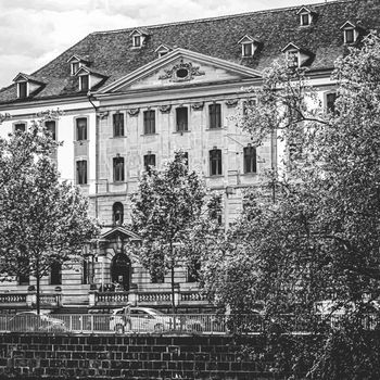 Zurich, Switzerland circa June 2021: Vintage monochrome view of historic Old Town streets and buildings near main train station Zurich HB, Hauptbahnhof, Swiss architecture and travel destination