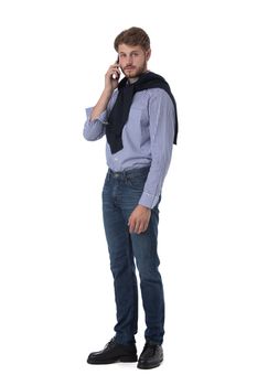 Full length Portrait of handsome young man using mobile phone, isolated on white background