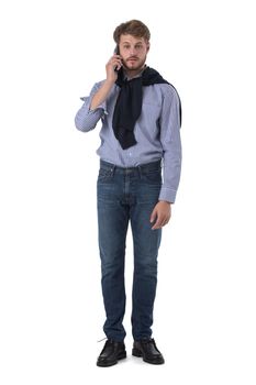 Full length Portrait of handsome young man using mobile phone, isolated on white background