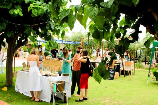 Elche, Alicante, Spain- June 20, 2021: Ecological, secondhand and sustainable market held in a rural setting in the countryside of Elche