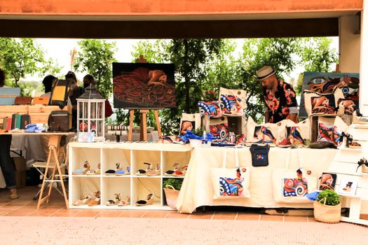 Elche, Alicante, Spain- June 20, 2021: Handicrafts products for sale at an ecological and sustainable market in Elche, Alicante, Spain