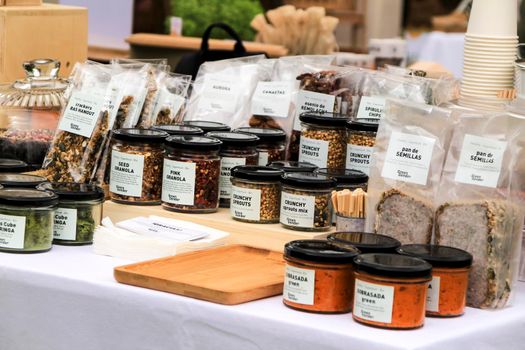 Elche, Alicante, Spain- June 20, 2021: Fresh products for sale at an ecological and sustainable market in the countryside of Elche