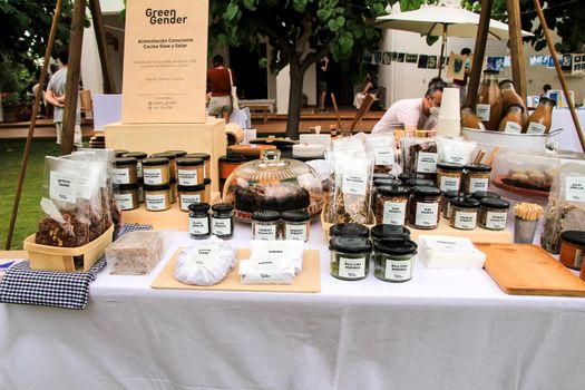 Elche, Alicante, Spain- June 20, 2021: Fresh products for sale at an ecological and sustainable market in the countryside of Elche