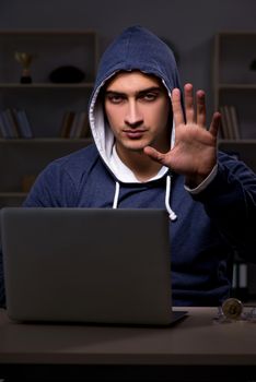 Hacker hacking the data late at night