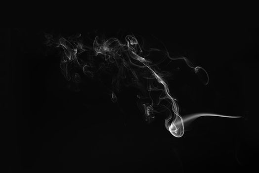 Smoke on a black background.