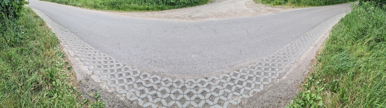 Panorama of countryside roads with fields and trees in northern europe.