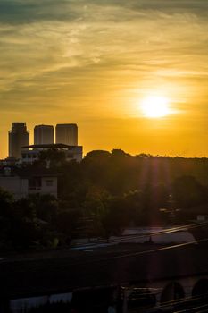 Sunrise and the city in the morning