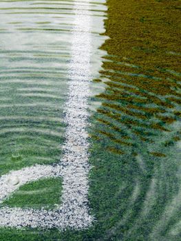 Flooding in artificial grass football field