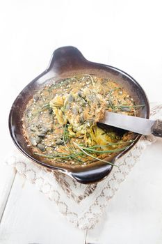 Vegan omelette cuisine made with natural ingredients such as chickpea flour and agretti 