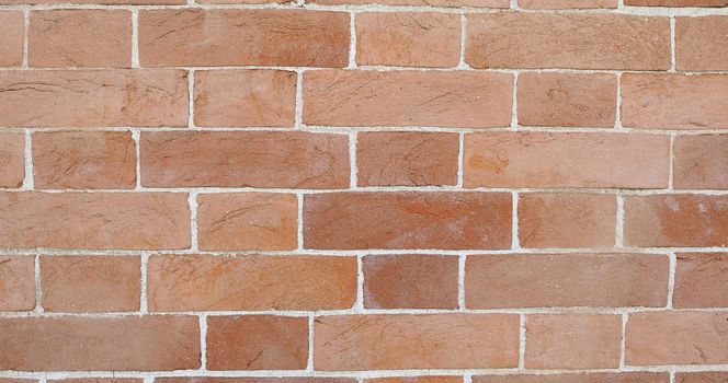 wide 4K red brick wall useful as a background